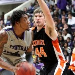 First Place Rhodes Holds Off Hendrix 57-55