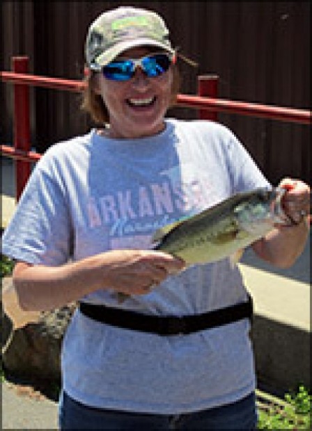 Jennifer Jones catches fish in Lake Hamilton