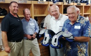 Coach Buck Buchanan in the new locker room with Hendrix Warriors alums (from left) Ron Pyle, Dr. Joe Bates and Bill Lefler