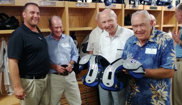 Coach Buck Buchanan in the new locker room with Hendrix Warriors alums (from left) Ron Pyle, Dr. Joe Bates and Bill Lefler