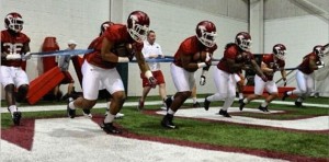 Alex Collins and teammates during spring practice 2014